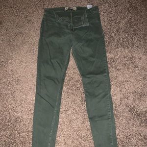 Green Hollister skinny jeans